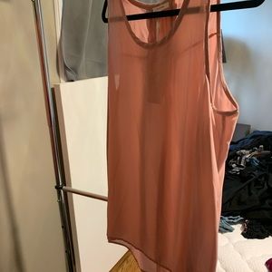 Beautiful tunic sleeveless top with nice detail.